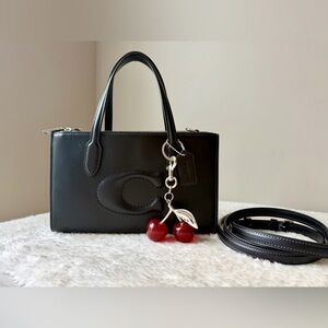 Coach Nina Small Tote in black with cherry charm